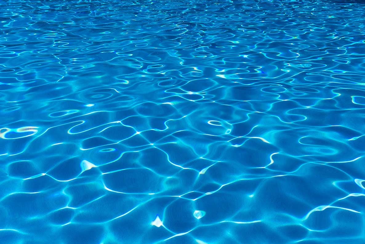 Swimming pool surface with patterns and ripples - westwoodgroup.com